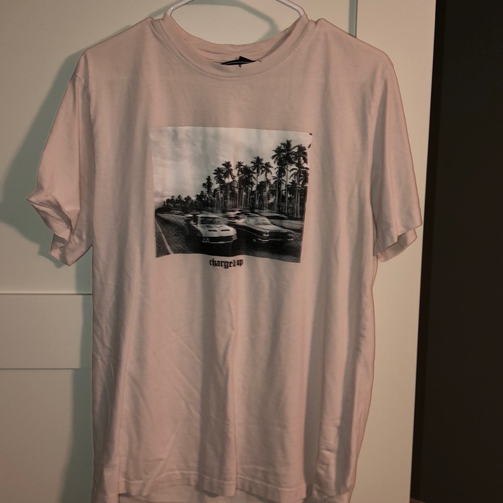 Pink shirt with vintage car picture on it